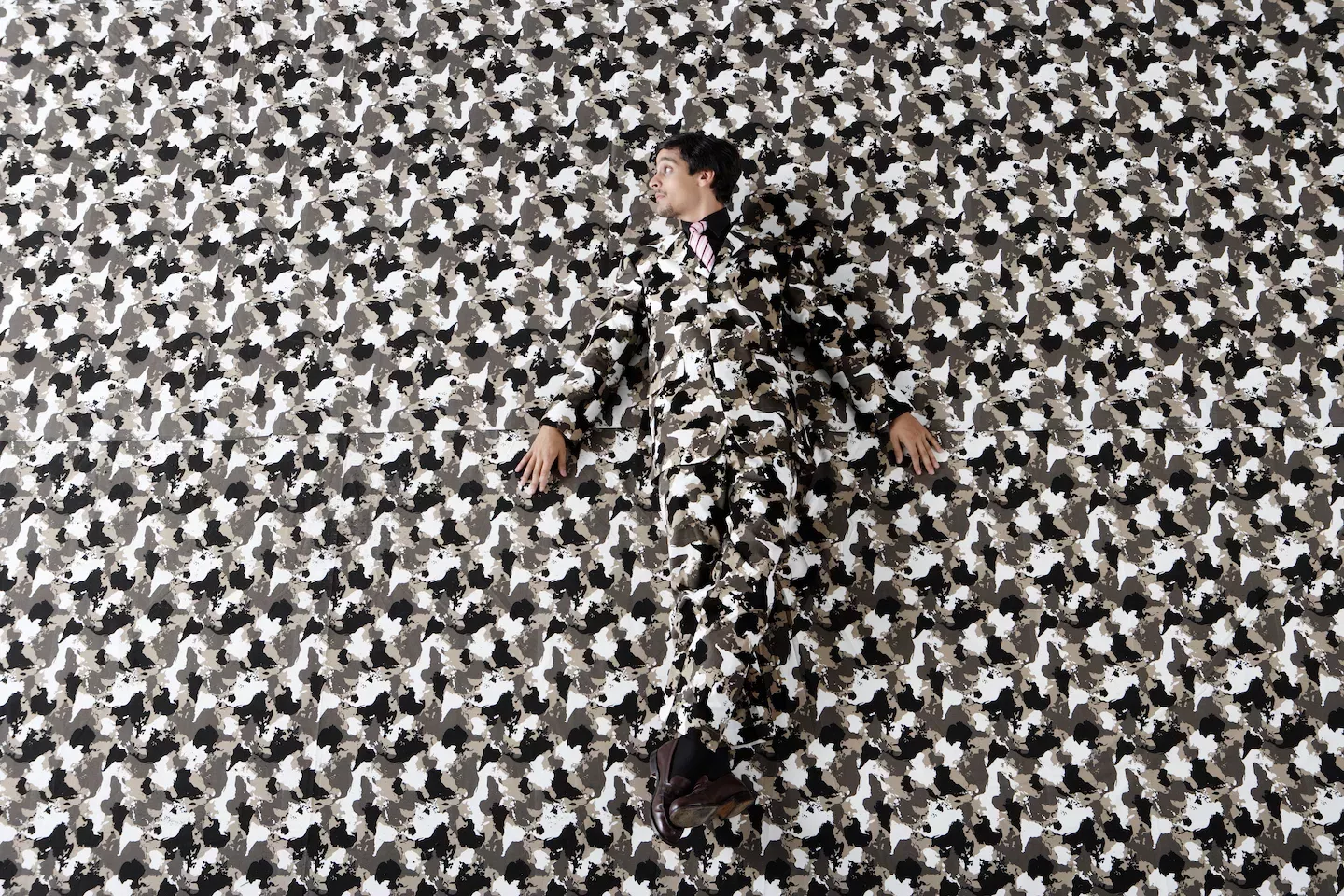 Man blending into the background Man blending into the background