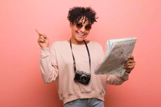 woman holding travel map