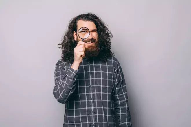 looking through magnifying glass