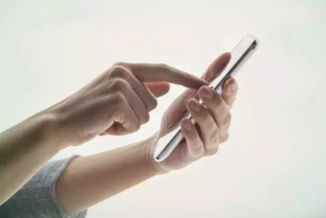 Person using cel phone