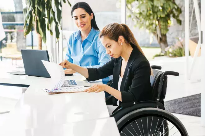 coworkers collaborating in office