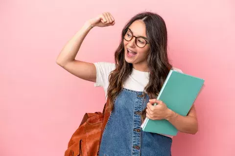 AdobeStock_465097434.jpeg college student flexing arm
