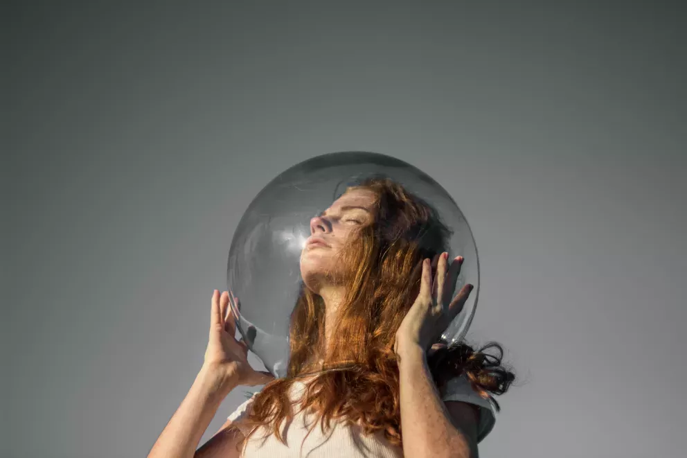 Person with a bubble over their head