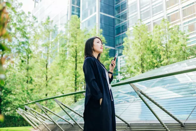 Woman executive outside of office building