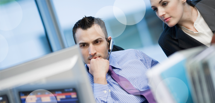 Outsourced Collections – Get Your ROI and ROO looking at screen Outsourced Collections – Get Your ROI and ROO