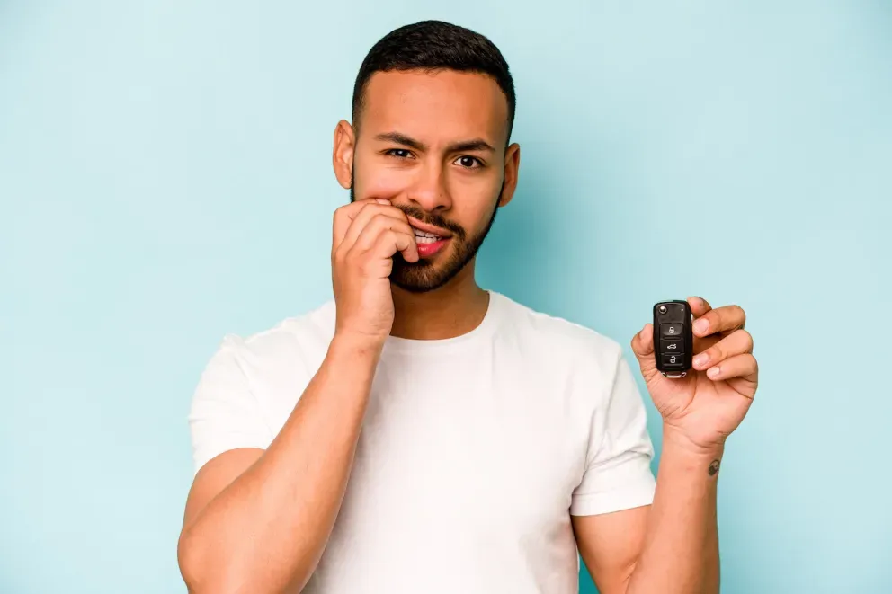 nervous person holding car keys