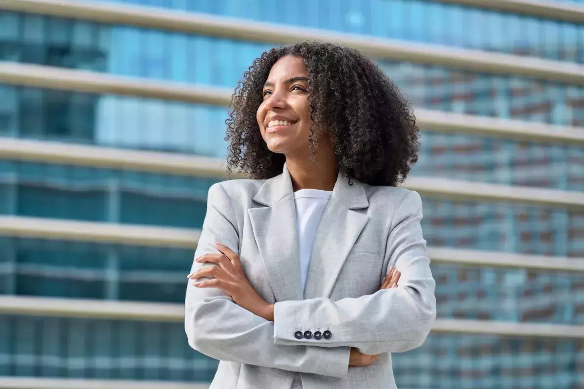 person standing with arms crossed