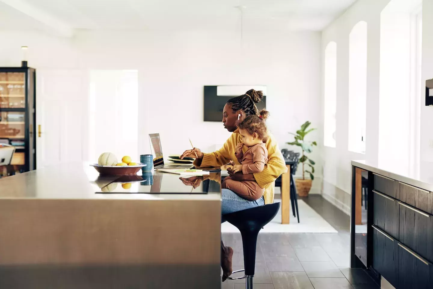 person at computer in home