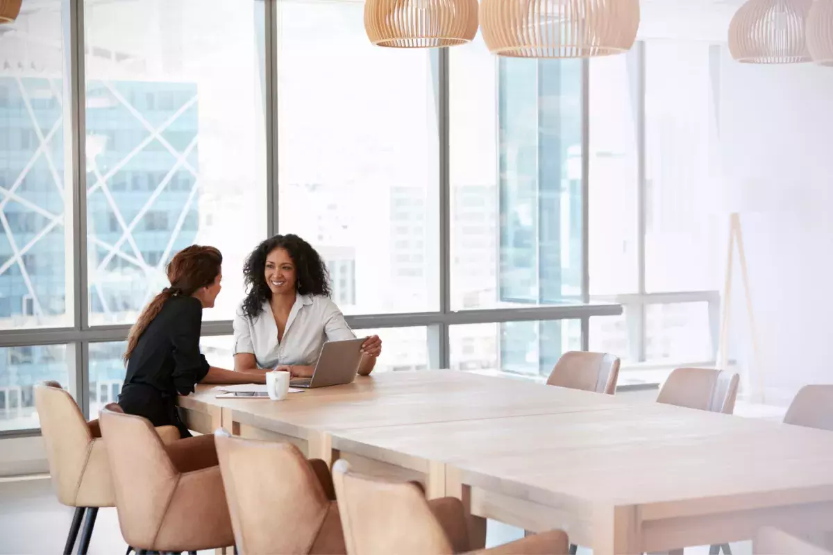 sitting at a meeting