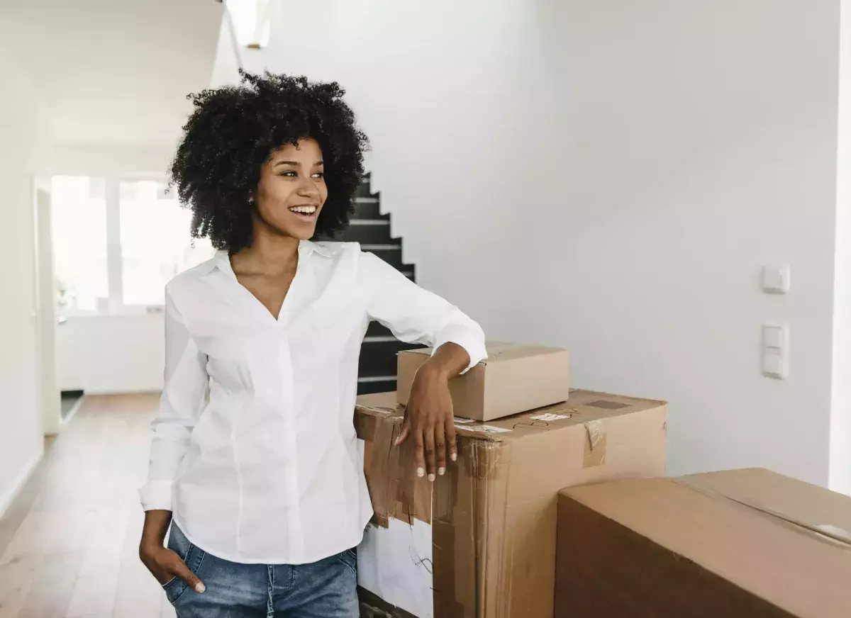 Woman moving into a new home