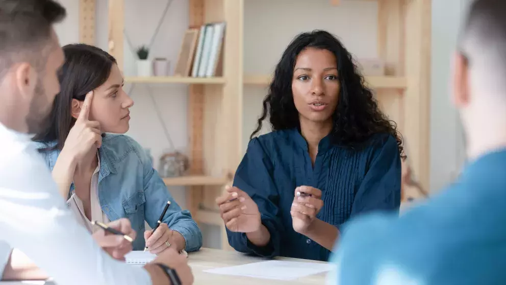 Woman speaking at a workshop