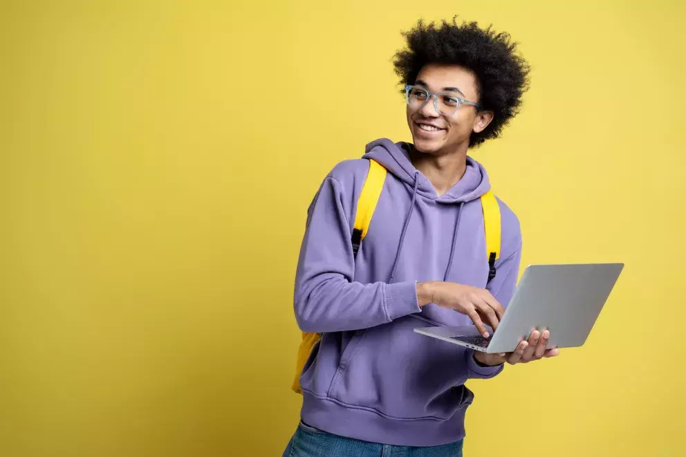 High school student with laptop