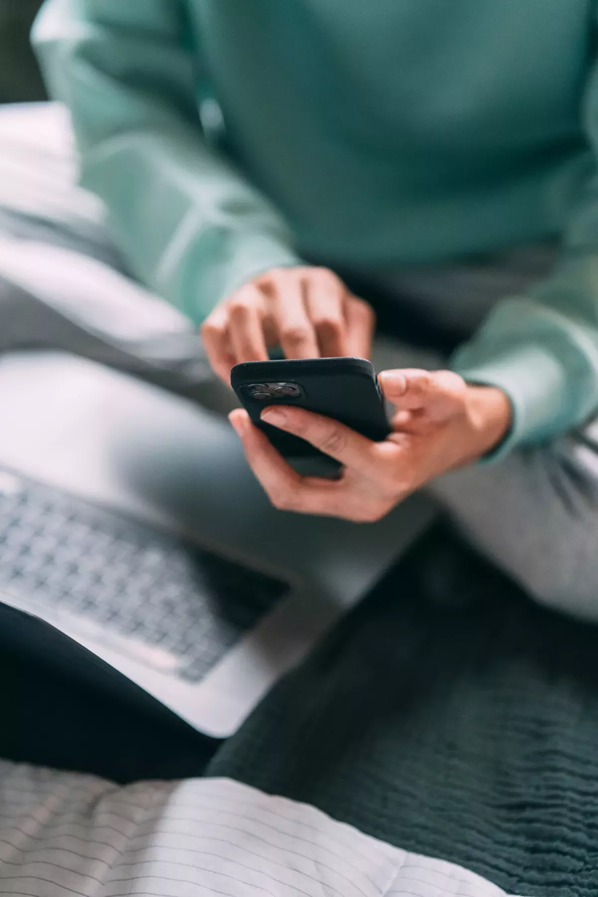7674820.jpg Person using a phone