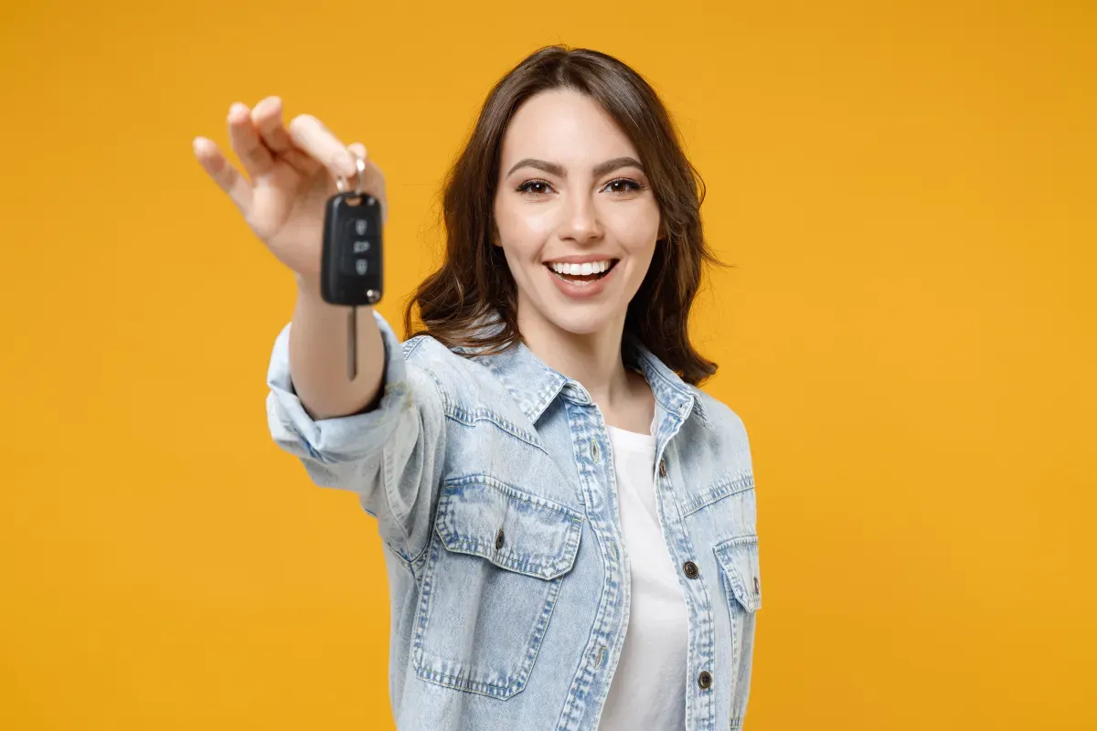 AdobeStock_420523135.jpeg Woman holding a set of car keys