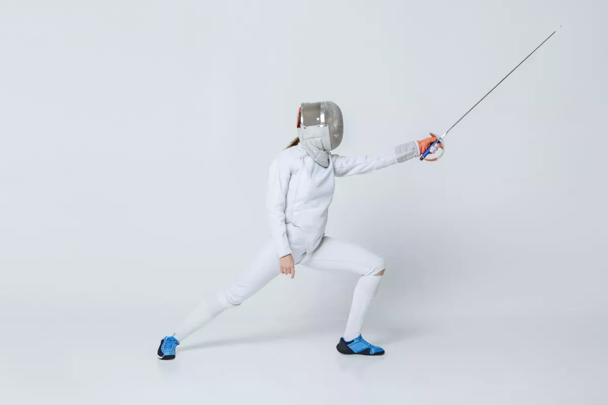 GettyImages-1356877234_Protect & Comply person in all white fencing outfit