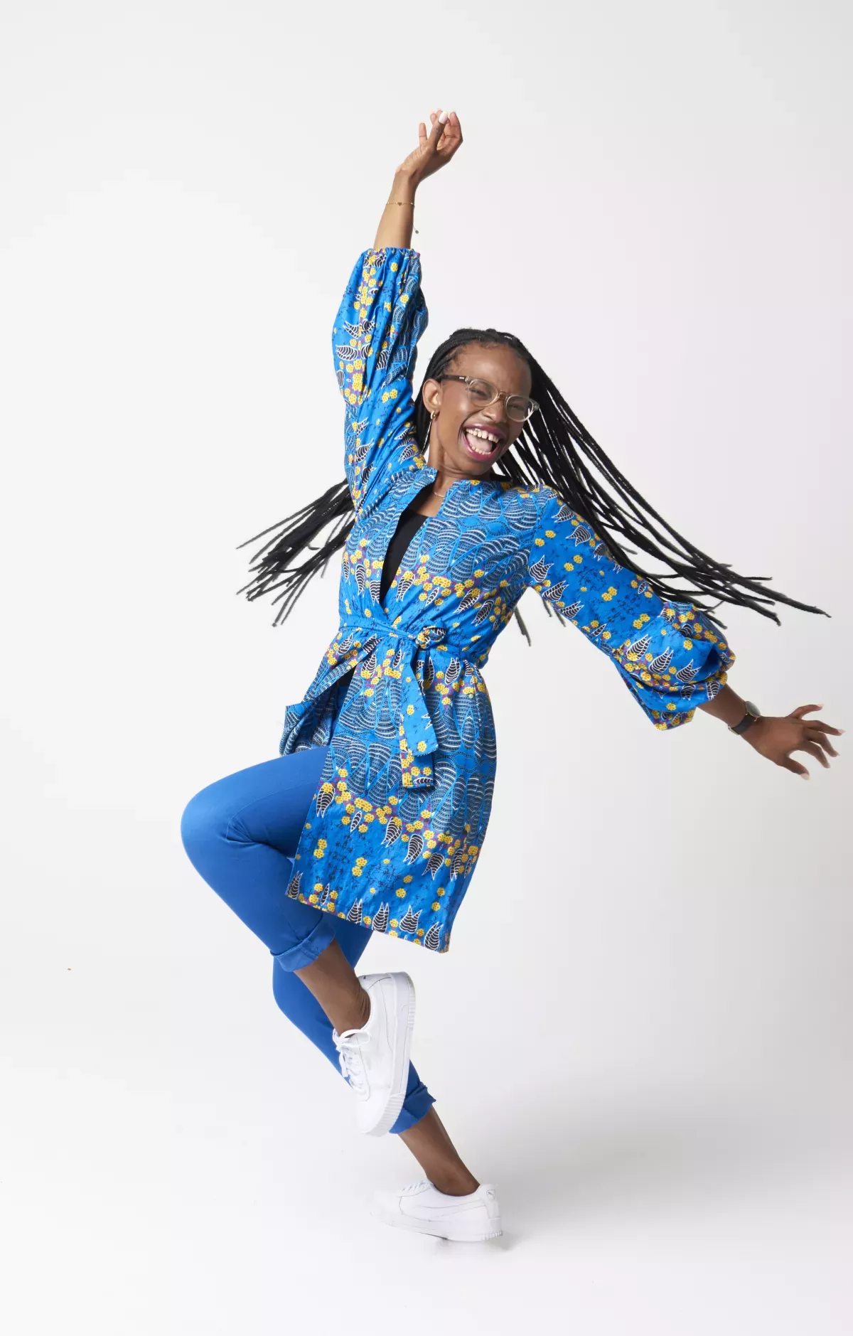 GettyImages-1404028463.jpg woman leaping with joy