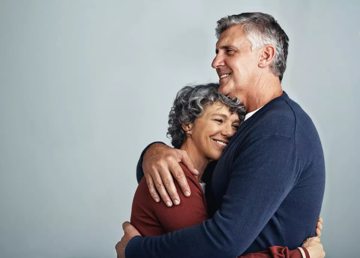 GettyImages-687441958.jpg Husband and wife hugging each other