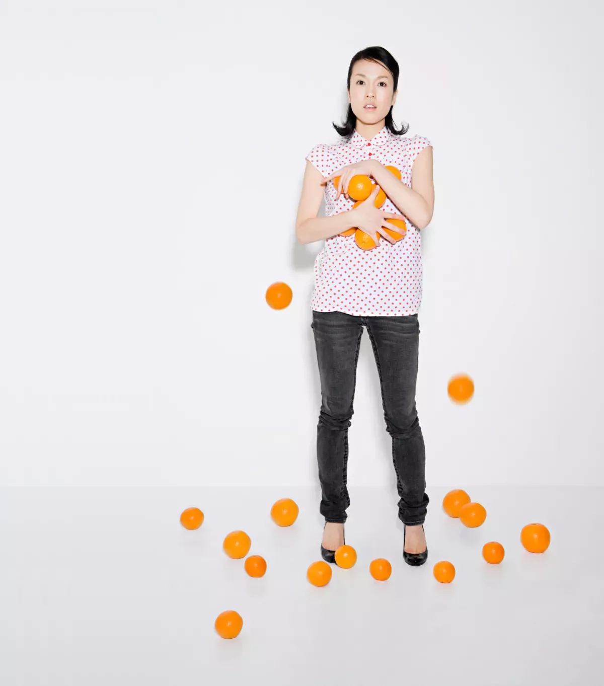 Optimization.png Woman holding oranges