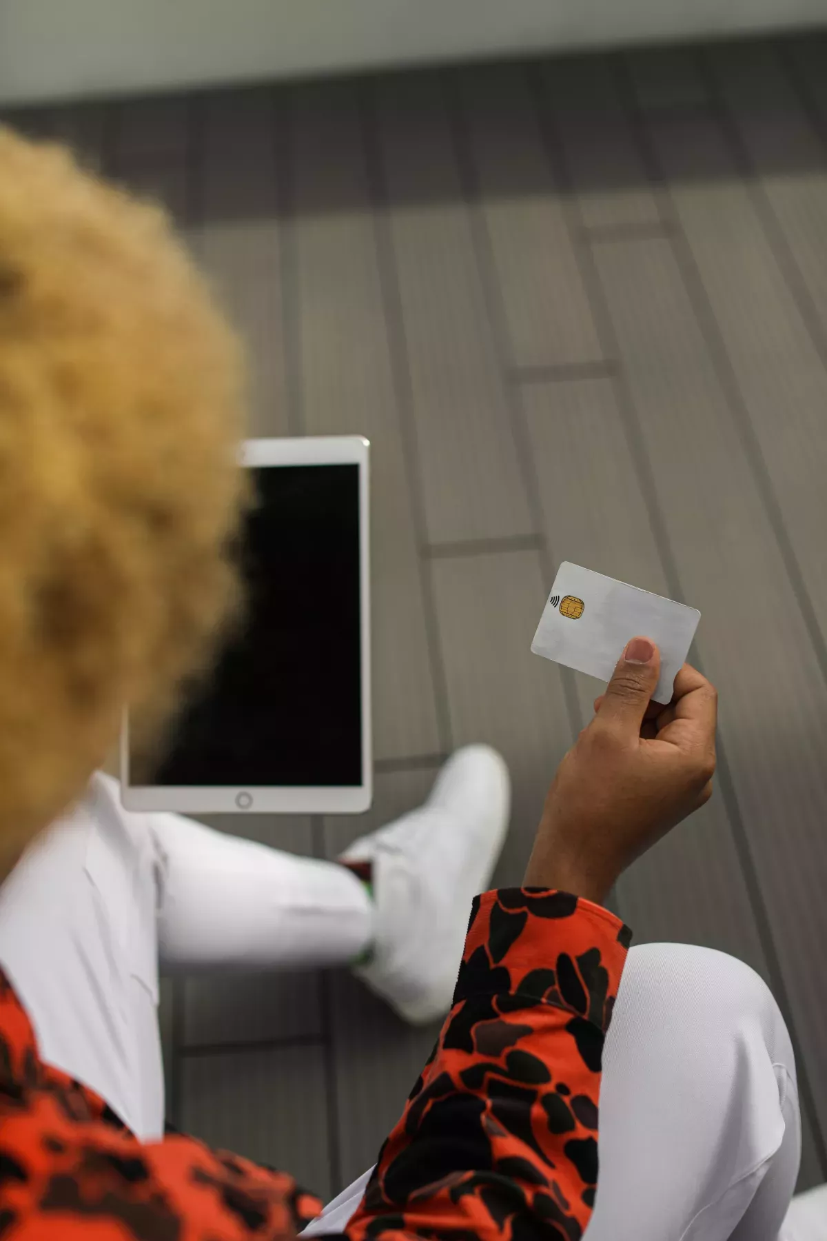 pexels-6956799_FICO Falcon Fraud Manager close up of person shopping on tablet with a credit card
