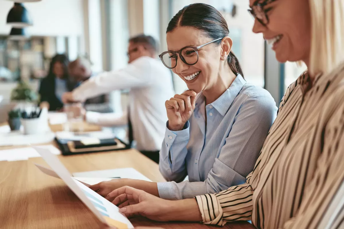 Colleagues smiling at the office