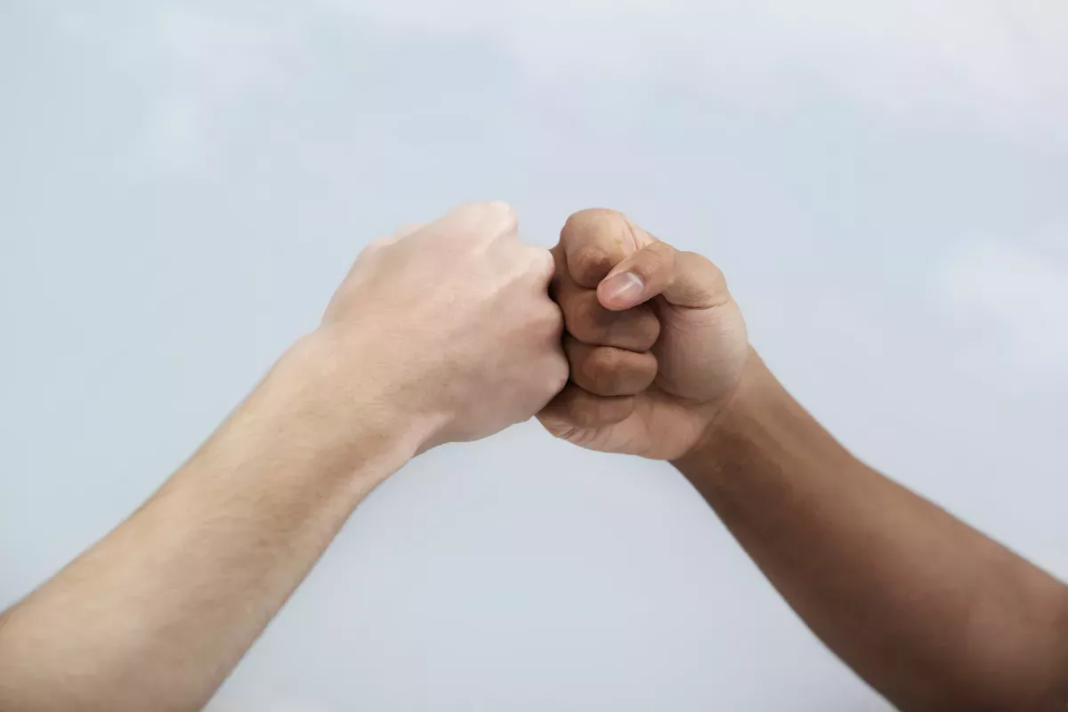 GettyImages-1365592606.jpg Two hands giving a fist bump