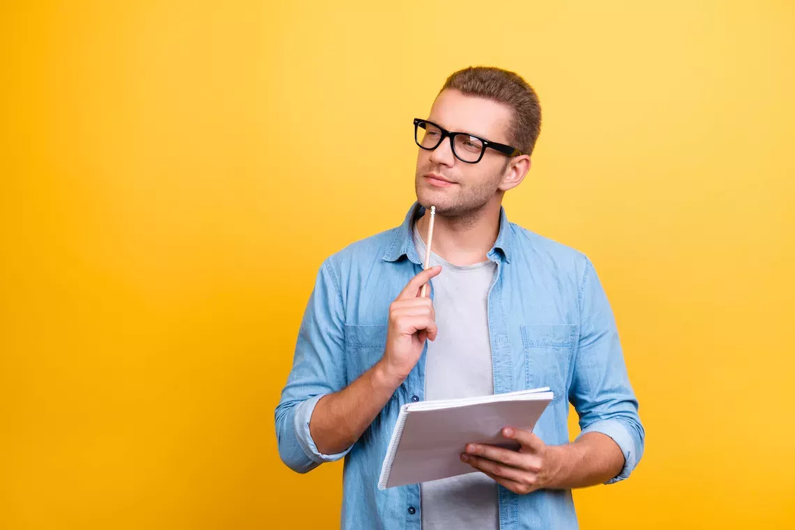 AdobeStock_184532165.jpeg man taking notes