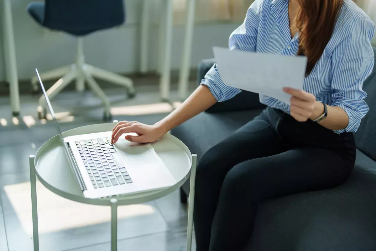 AdobeStock_505257395.jpeg Person applying for a loan online