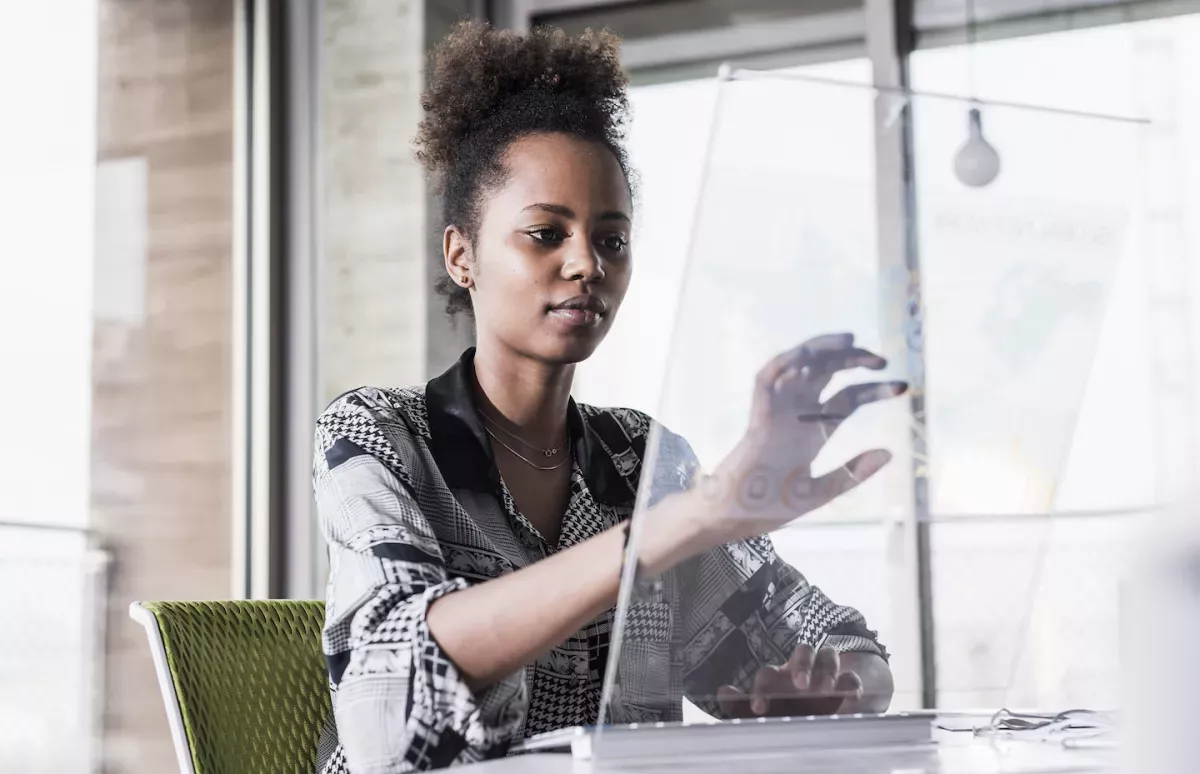 GettyImages-707452577.jpg Woman using a touch screen