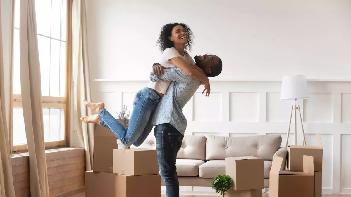 AdobeStock_304762423.jpeg Man and woman happy
