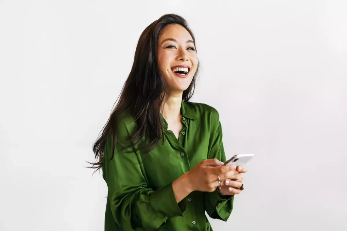 woman on phone smiling