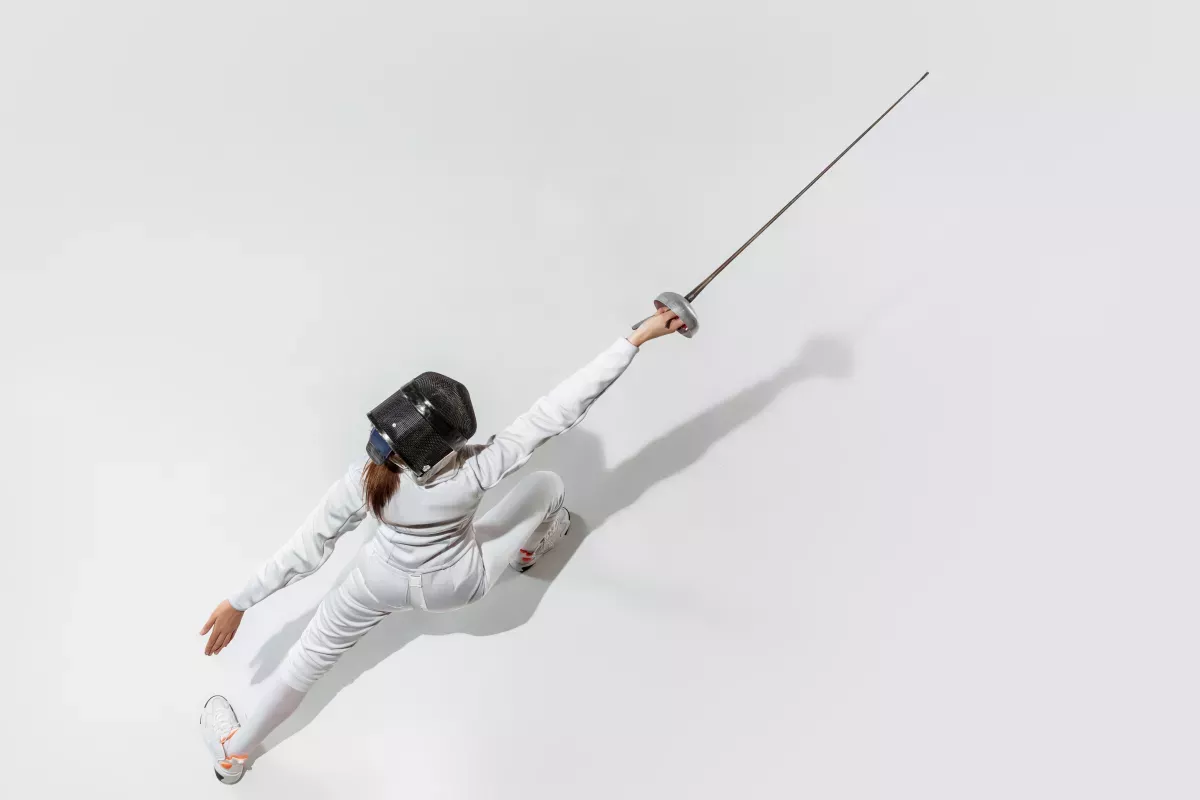 AdobeStock_369245414.jpeg Fencer protecting herself