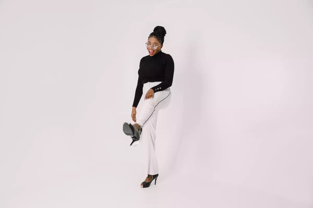 AdobeStock_565604305.jpeg Business woman leaping with excitement