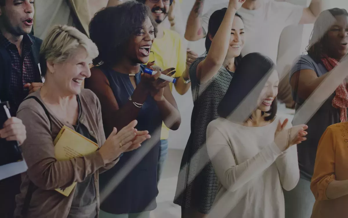 people cheering in crowd