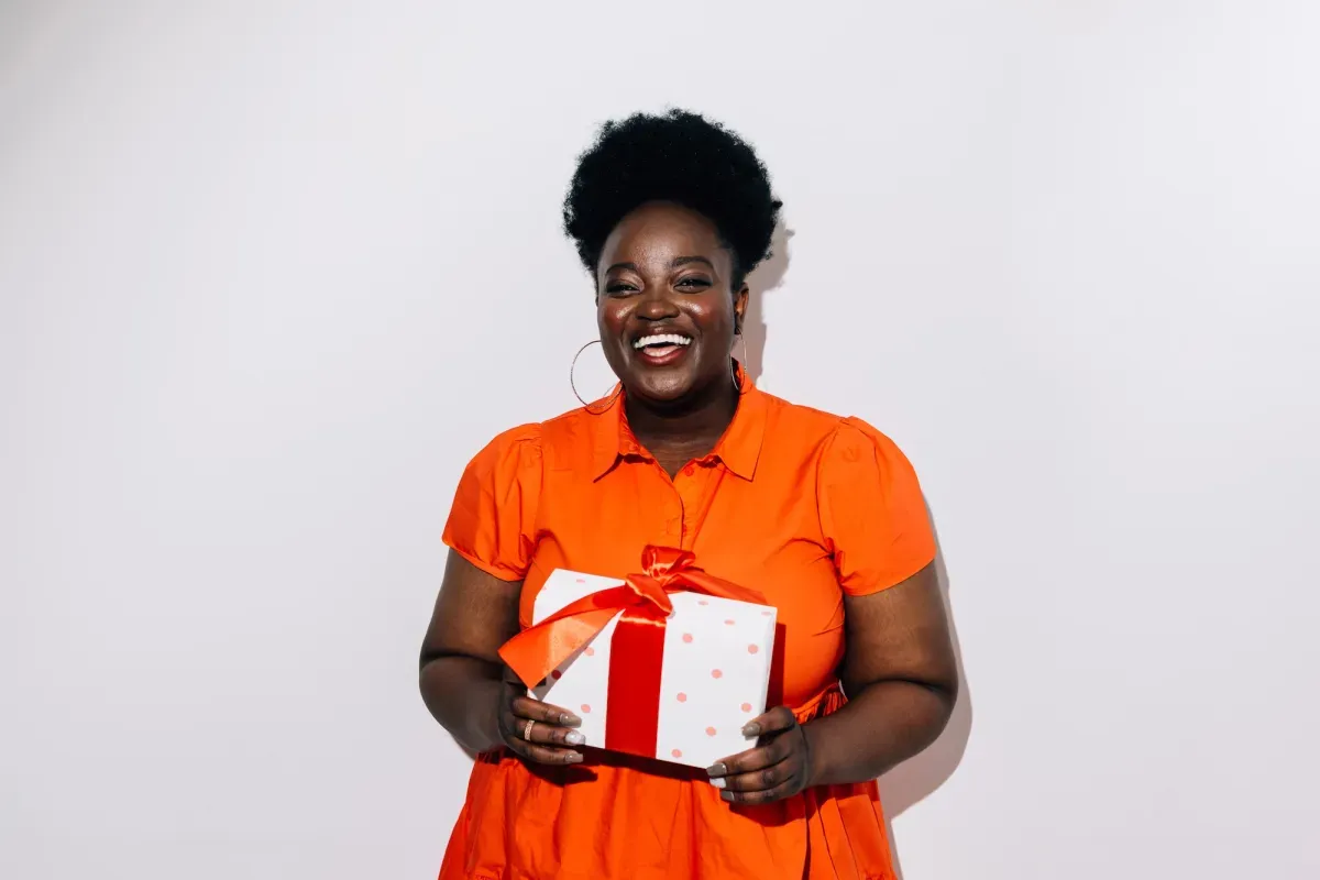 Woman holding holiday gift