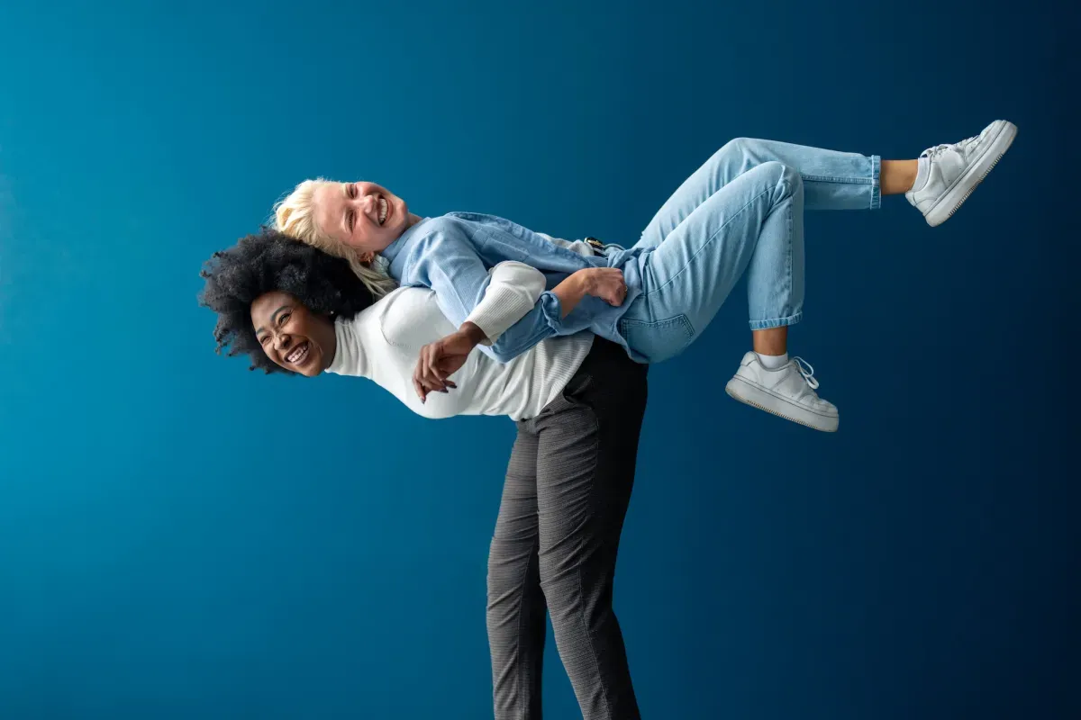 Two women playful