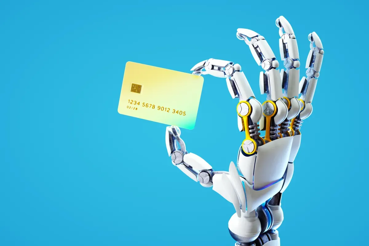 Robot holding credit card