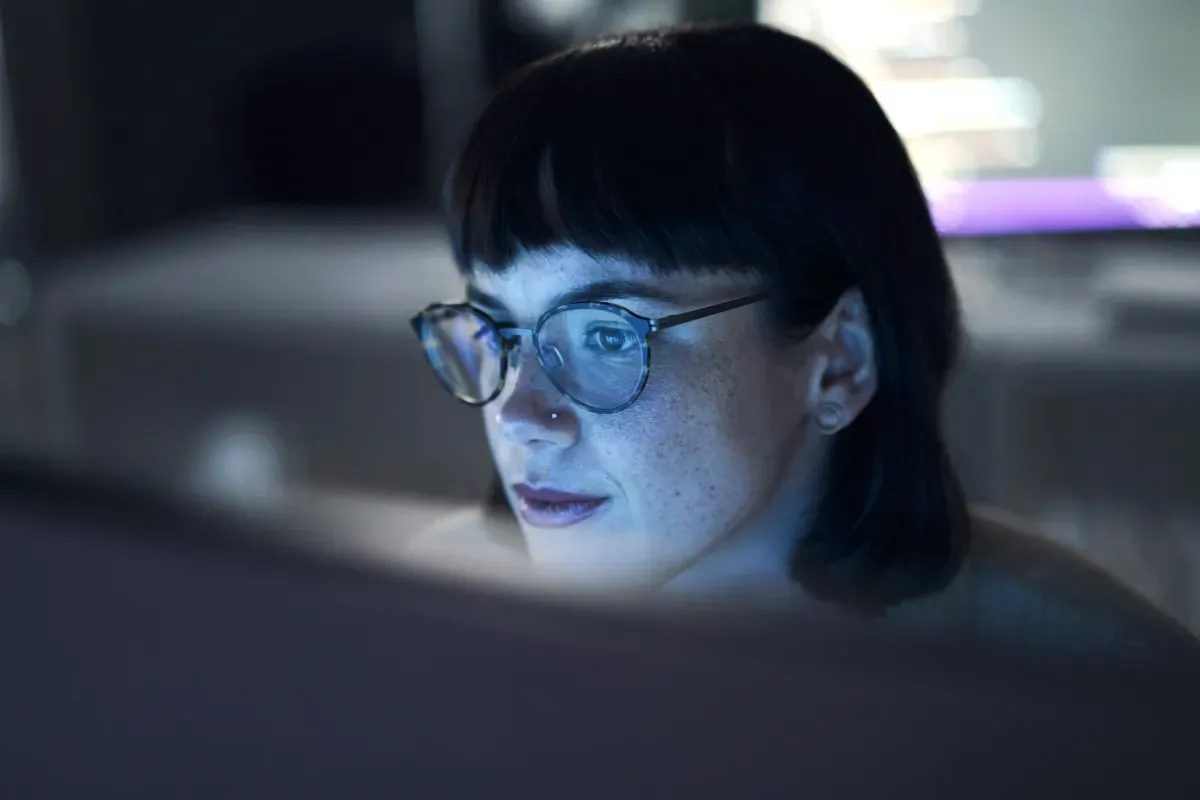 Woman looking at computer Woman looking at computer