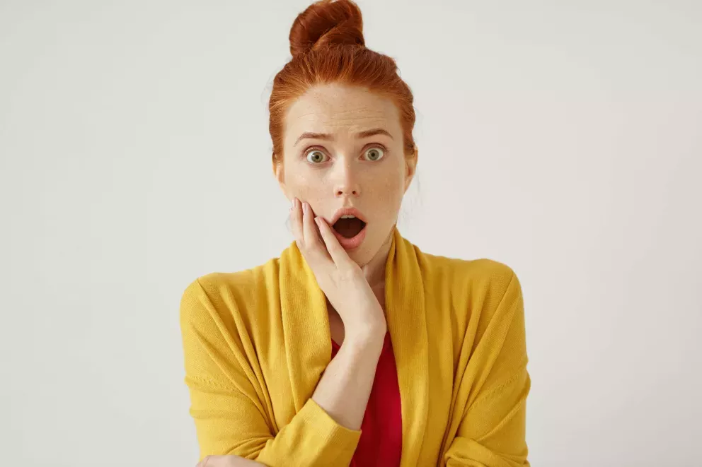 woman with shocked expression woman with shocked expression