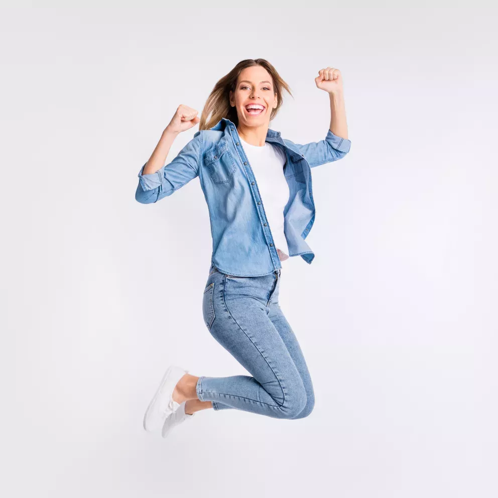 woman leaping with joy woman leaping with joy