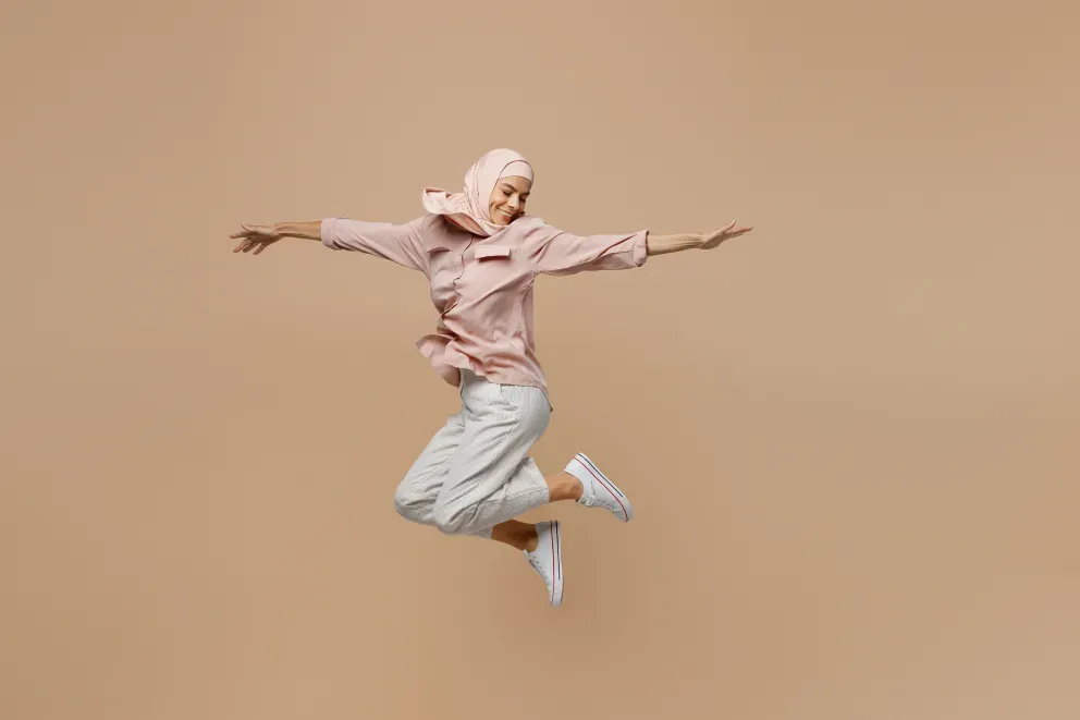 woman leaping with joy