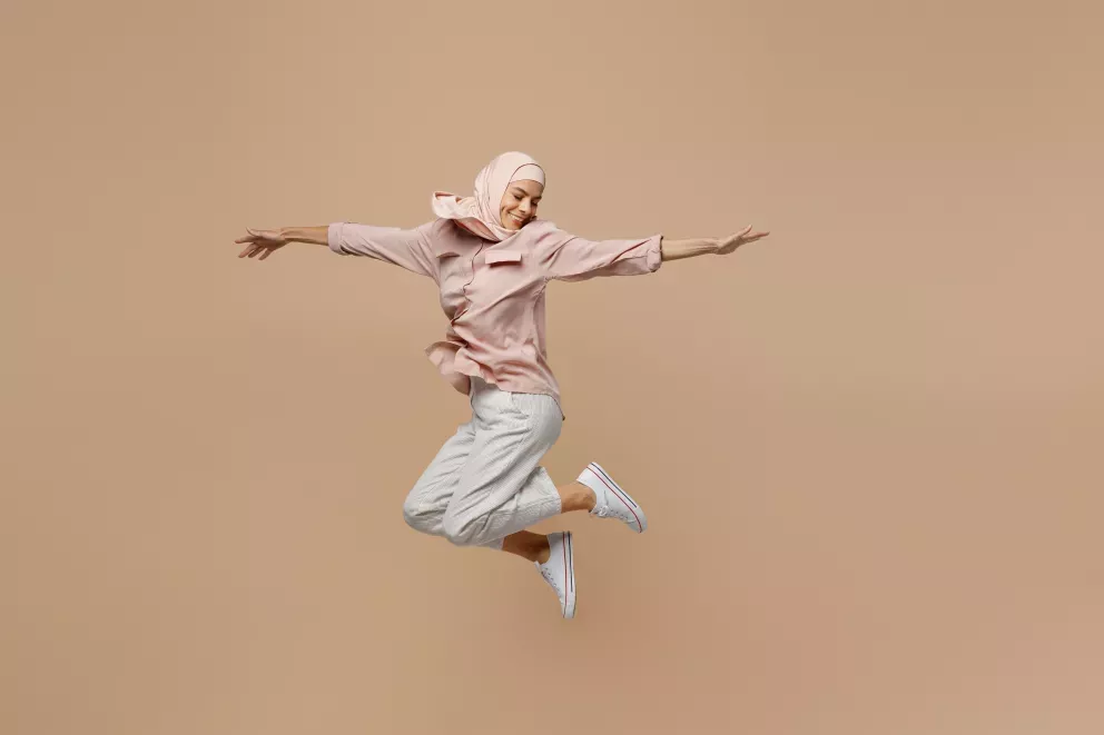 woman leaping with joy