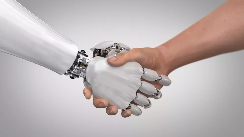 human and robot shaking hands human and robot shaking hands