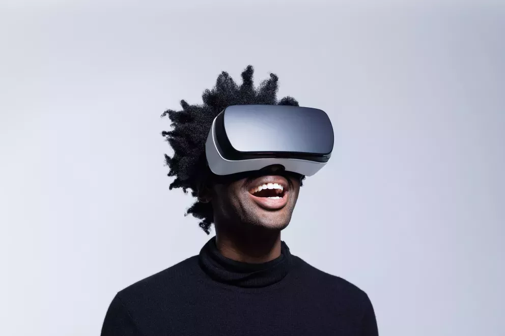 person using virtual reality headset person using virtual reality headset
