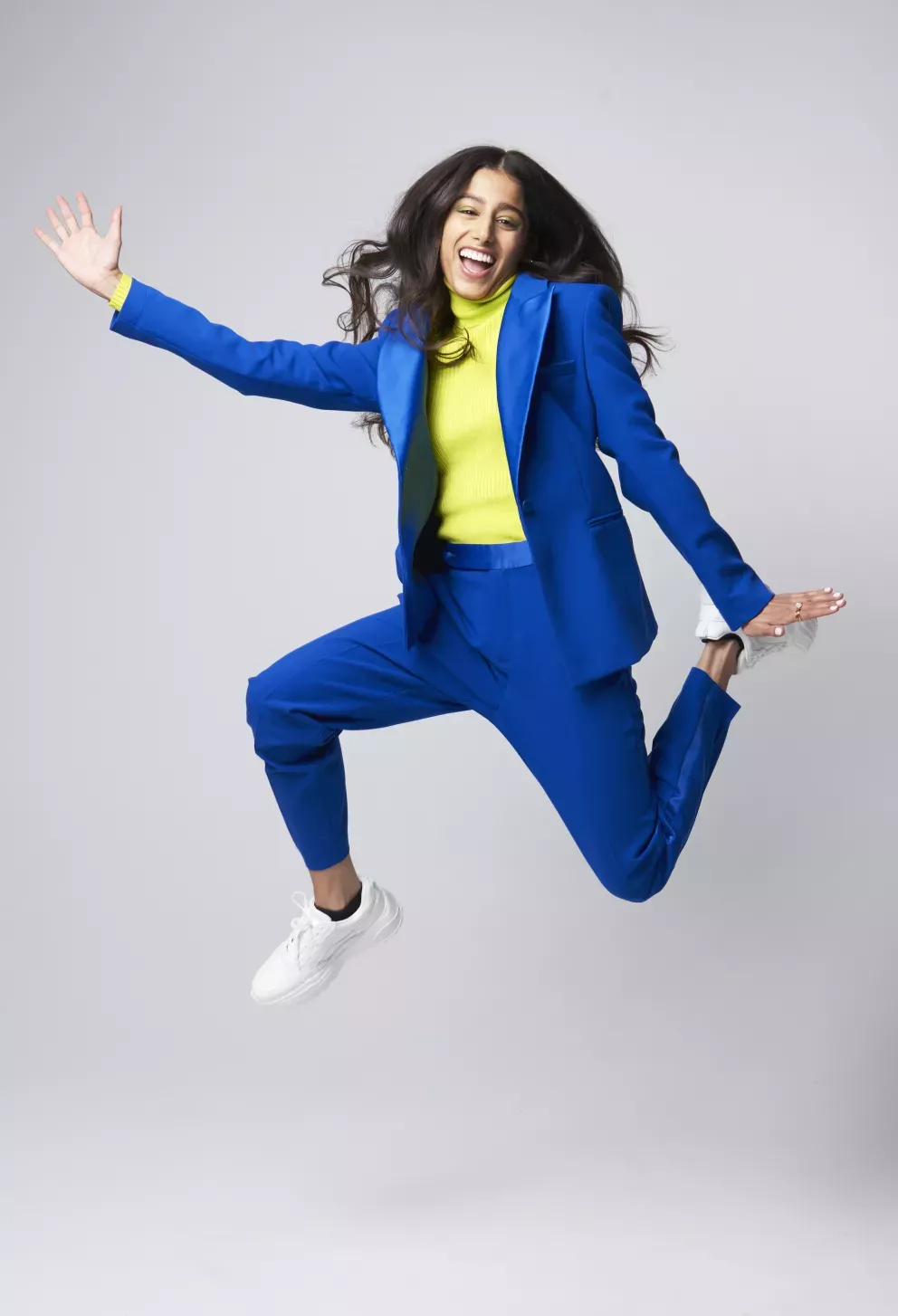 woman leaping with joy woman leaping with joy