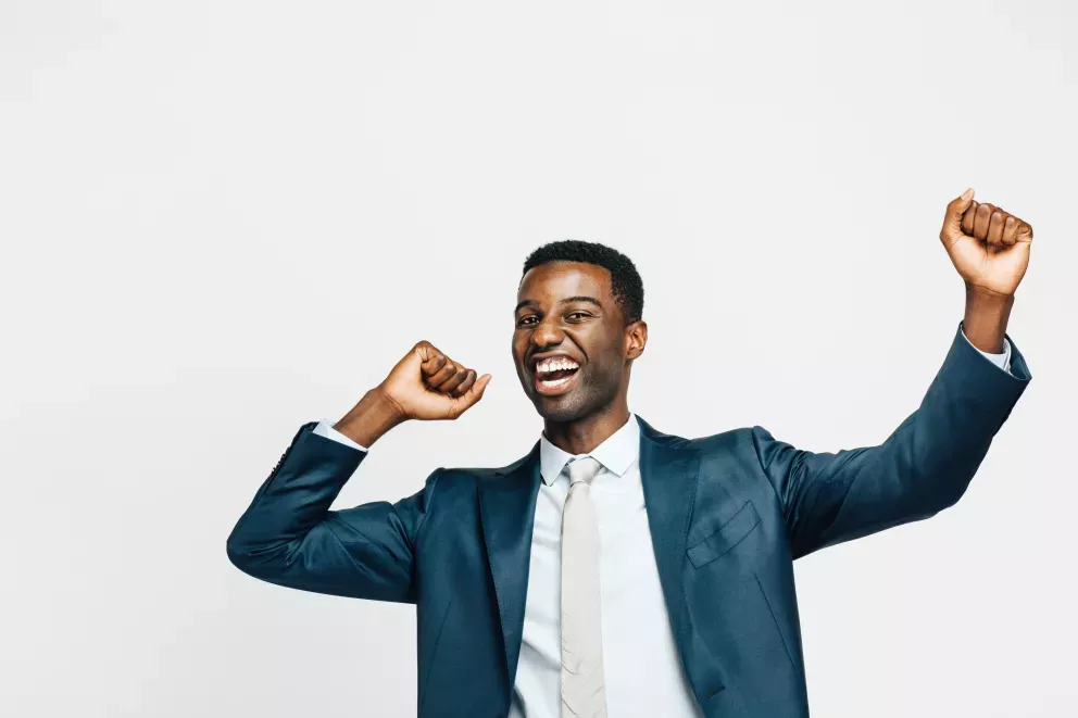 man exclaiming with joy