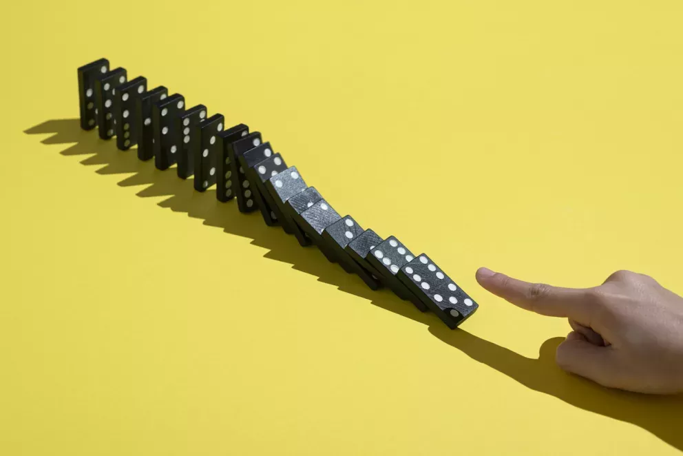 Finger knocking down dominoes Finger knocking down dominoes