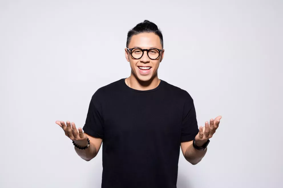 Man with arms out