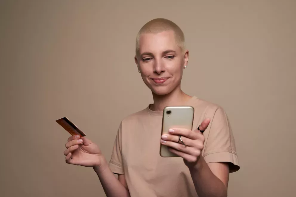 Person banking on mobile phone