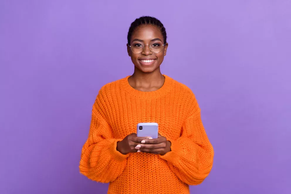 happy person using cell phone happy person using cell phone