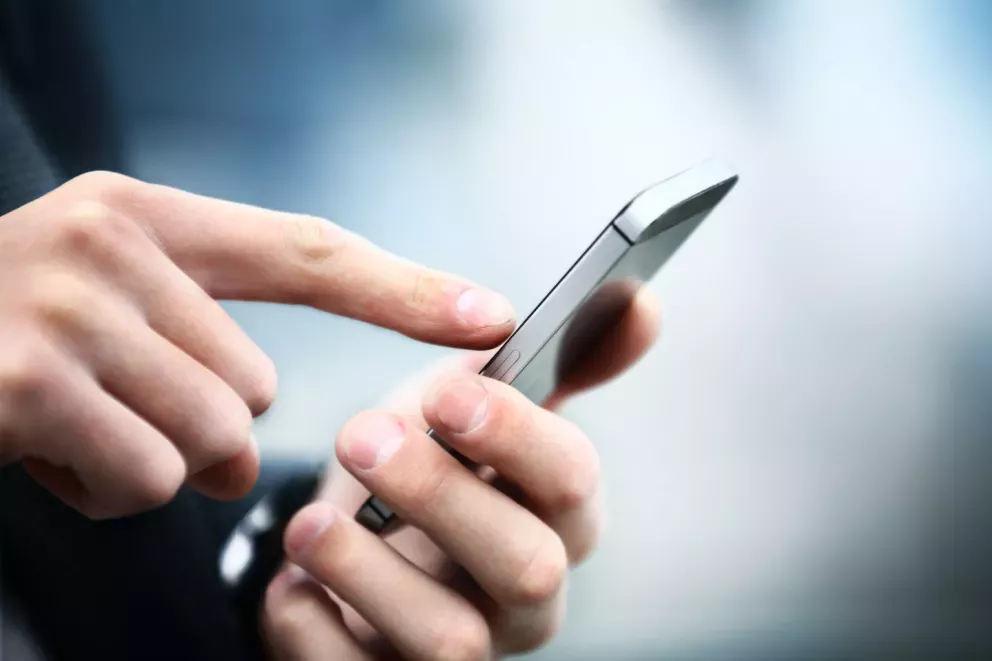 hands tapping on phone hands tapping on phone